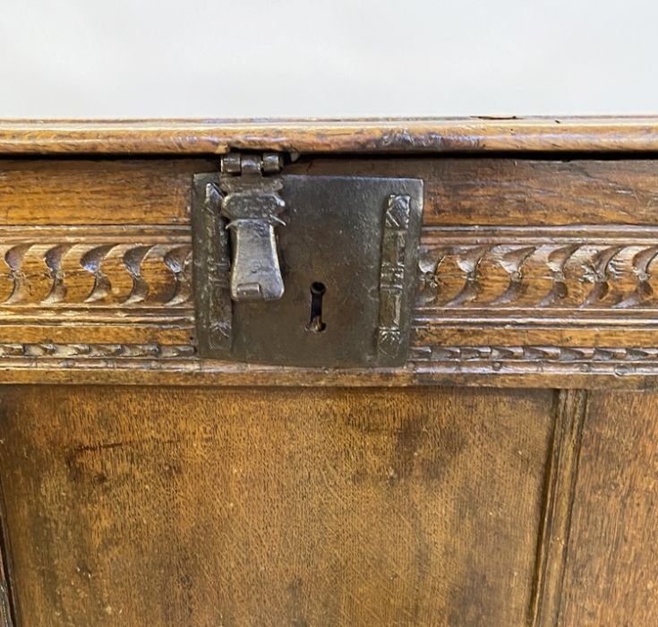 Large antique oak coffer having quadrant mould edge, scroll carved frieze, triple framed panel - Image 2 of 10