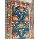 Shirvan wool carpet, the design inspired by a kilim from Kuba region and having green field with