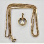 9ct gold and pearl set pendant, circular and open with single pearl and small diamond and 9ct gold
