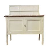 Painted marble-topped washstand having raised tile back, variegated marble top cupboard below, 107cm