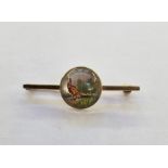 Gold-coloured metal reverse intaglio bar brooch, circular, painted with pheasant, marked 'B&S'