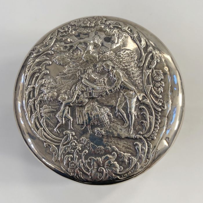 Edwardian silver lidded cut glass powder bowl, repousse decorated of a couple with child amongst - Image 3 of 4