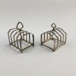 1930's silver toastrack, London 1933, maker W.B & Son Ltd., 3ozt approx. and another silver