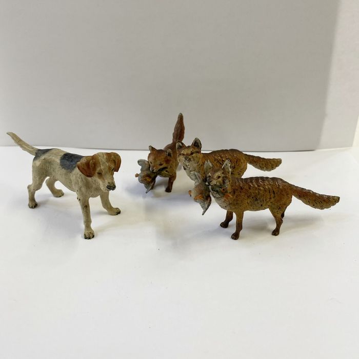 Austrian cold painted bronze models on animals to include a foxhound, 5cm, a fox, 4cm high, a fox