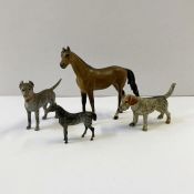 Cold painted bronze models of animals:- a bay horse, 4cm to his wither, a miniature cold painted