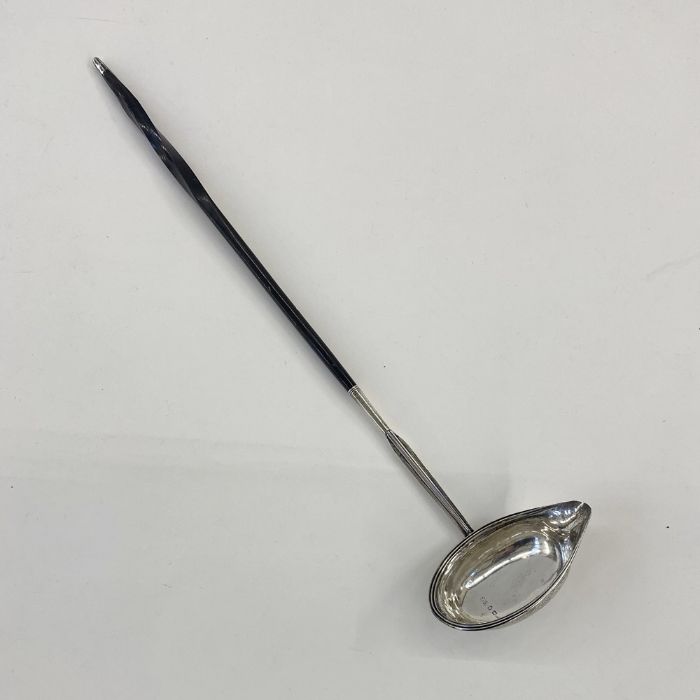 George IV silver toddy ladle with ebony handle and silver finial, London 1829, maker's mark worn '