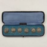 Edwardian silver buttons marked L&S 1904, showing cherub's heads, in likely original box