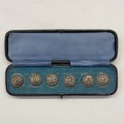 Edwardian silver buttons marked L&S 1904, showing cherub's heads, in likely original box