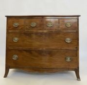 Georgian mahogany serpentine fronted chest of one long and two short frieze drawers, two further