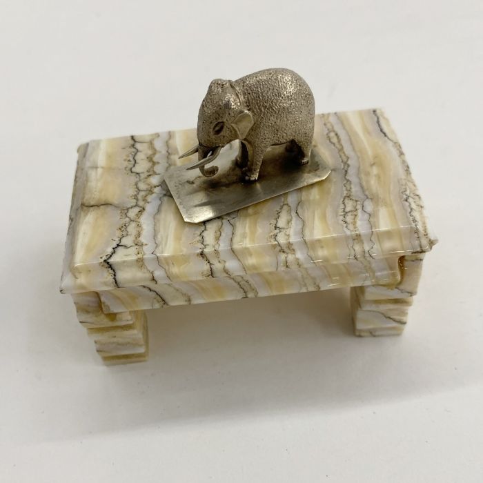 Two Russian papier-mache boxes, red agate and metal seal, white metal and marble elephant on - Image 3 of 4