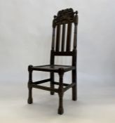 Antique stained wood Carolean-style side chair having ornate scroll and floral carved toprail,