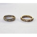 Gold-coloured metal eternity ring set white stones and another gold and silver-coloured metal ring