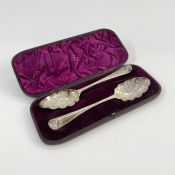 Cased pair silver berry spoons with later engraving, London essay 3ozt approx., box labelled 'T.J.
