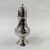Early 20th century silver sugar caster of waisted form, Birmingham 1918, 19cm high, 4ozt approx.