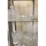 Various cut glass items to include two pudding bowls, two vases, a celery vase, a biscuit barrel and