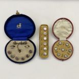 Edwardian dress stud set gold-coloured metal surround, with green glass central stone, a key fob,