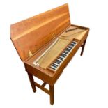 1975 clavichord in figured lightwood, possibly fruitwood, case with pale wood to the interior, on