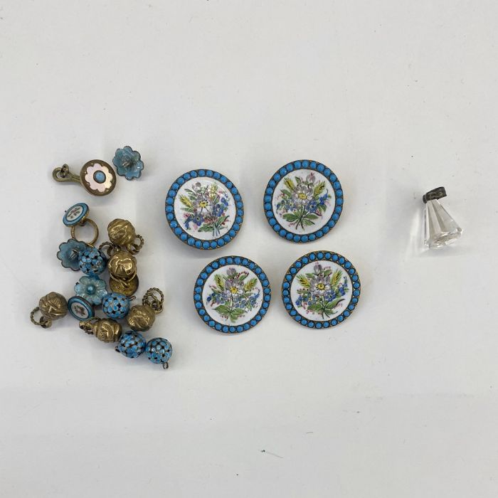 Four late 19th century French enamel and painted buttons with turquoise border, cloisonne circular