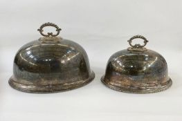 Two silver-plated meat domes, graduated (2)