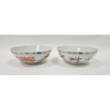 Pair of 20th century Chinese famille rose peach bowls in 19th century style, each painted with