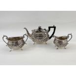 EPNS part tea service comprising teapot, sugar bowl and cream jug, on cabriole pad feet, gadrooned