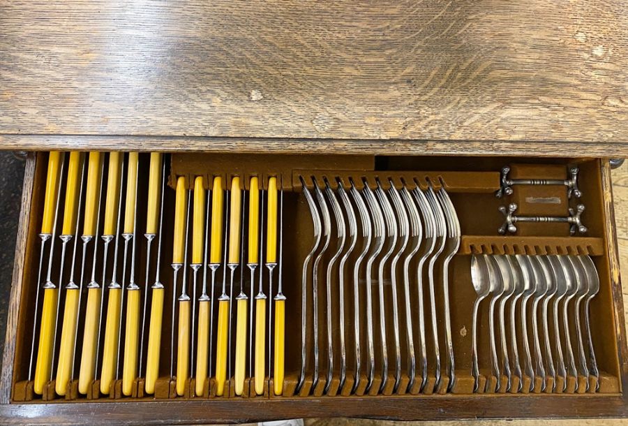 EPNS canteen for twelve within oak table, fitted with two drawers, on four turned supports with - Image 3 of 5