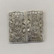 Nurse's silver buckle marked Chester 1907, maker's mark rubbed, pierced foliate design with