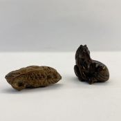 Japanese carved wood netsuke in the form of a seated foal, 4cm high and another in the form of a