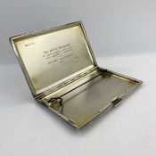 A 1930's silver cigarette case, engine turned inscribed 'to Dr. P. Hudson in appreciation of his