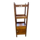 Stained walnut three-tier shelf with cupboard below, having turned finials, reeded uprights, 35cm