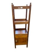 Stained walnut three-tier shelf with cupboard below, having turned finials, reeded uprights, 35cm