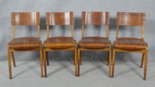 A set of four mid century vintage laminated ply stacking chairs with patent stamp for Tecta