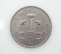 A Royal Mint error "Silver" Cupro-Nickel 1971 two pence coin. Reads 'NEW PENCE'
