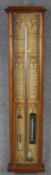 A late 19th century Admiral Fitzroys barometer with Gothic revival lithograph printed back papers,