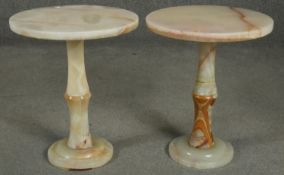 A near pair of marble pedestal tables. H.42 D.35cm