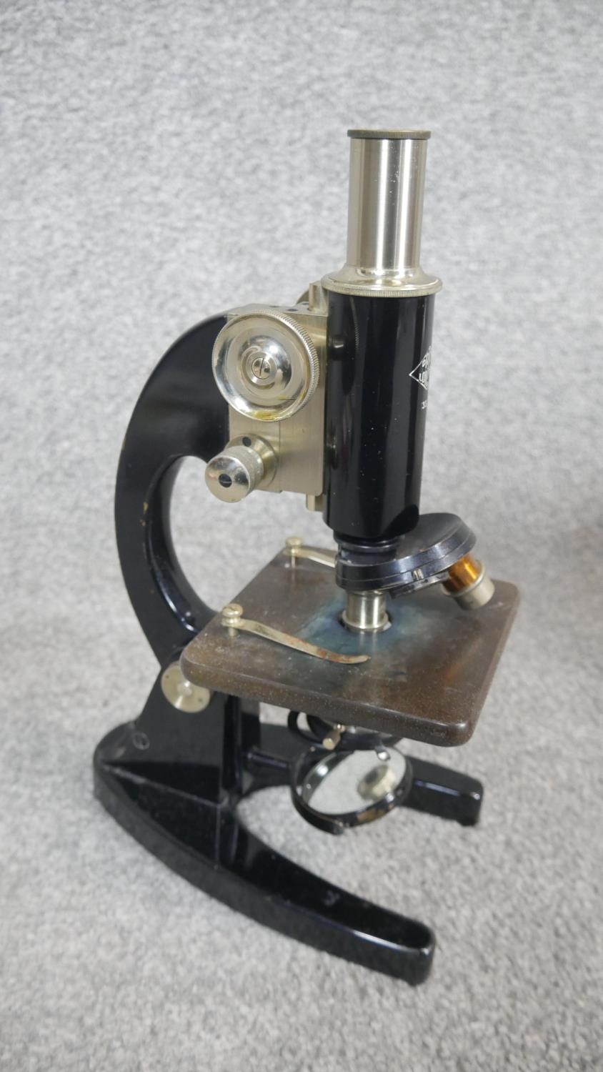 A vintage wooden cased W R Prior London microscope, model number 13377. With prepared slides and - Image 6 of 11