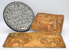 A collection of metal ware. Including two hammered copper repousse plaques, replicas of the Indus