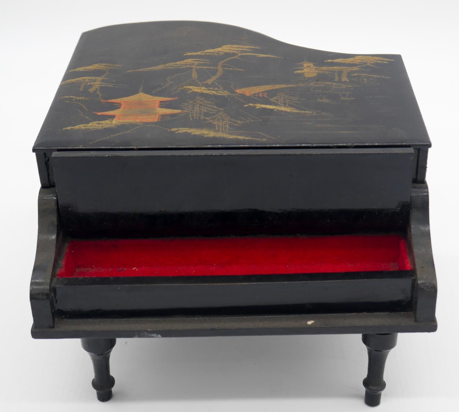 A vintage Japanese black lacquered and painted music box in the form of a grand piano. Lid painted - Image 3 of 8