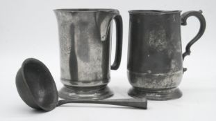 A collection of 19th century pewter. Including two pewter measures one with a spout, stamped QUART