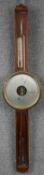 A 20th century mahogany wheel barometer with central silvered dial. H.100cm