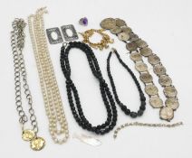 A collection of costume jewellery. Including a pair of Georgian style show buckles, an engraved