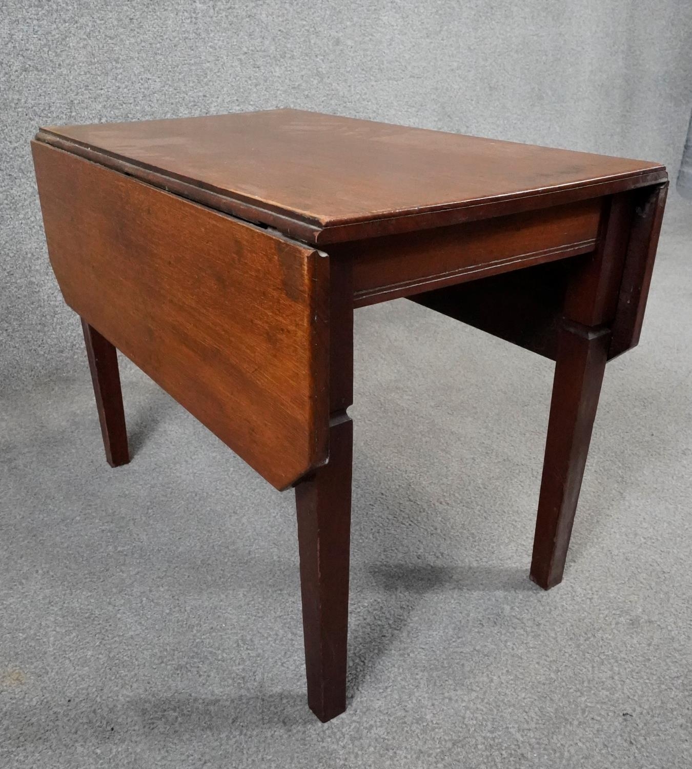 A 19th century mahogany drop flap table on square tapering supports. H.46 W.75 D.61cm - Image 3 of 6