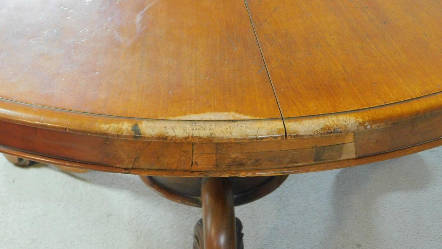 A Victorian mahogany tilt top dining table on tripod carved cabriole supports. H.68 W.122 D.122cm - Image 5 of 5