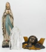 A vintage painted ceramic figure of the Virgin Mary, a carved glass intaglio block of the Virgin