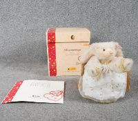 A boxed limited edition Steiff Rauschgoldengel angel teddy bear with certificate and Steiff button
