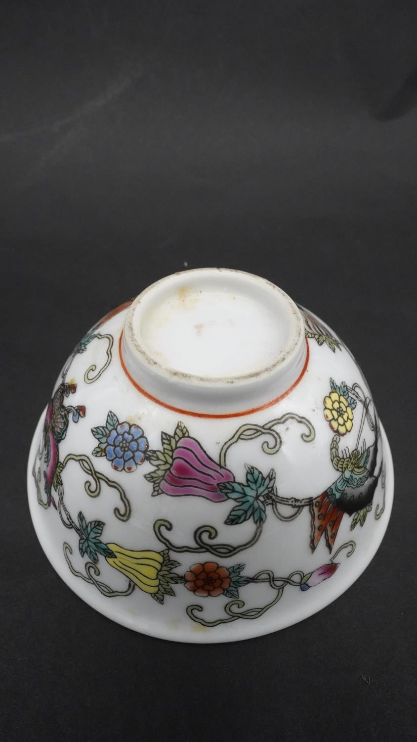 A pair of Chinese Qing period Famille Rose porcelain bowls. Decorated with flowers, fruit and - Image 3 of 3