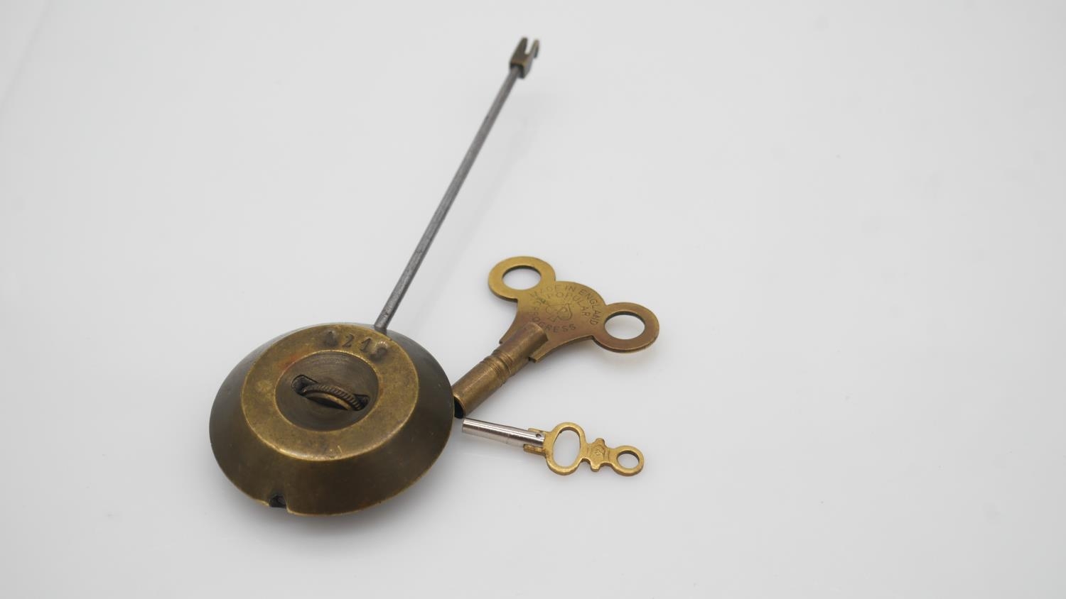 A 19th century French brass mantel clock modelled as a bell, the dial with enamel Roman numerals, - Image 5 of 6