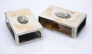 Charles Boyton, Two Art Deco white metal match box covers, planished cuboid form, with applied