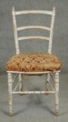 A late 19th century upholstered bedroom chair in original paint. H.82cm