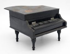 A vintage Japanese black lacquered and painted music box in the form of a grand piano. Lid painted